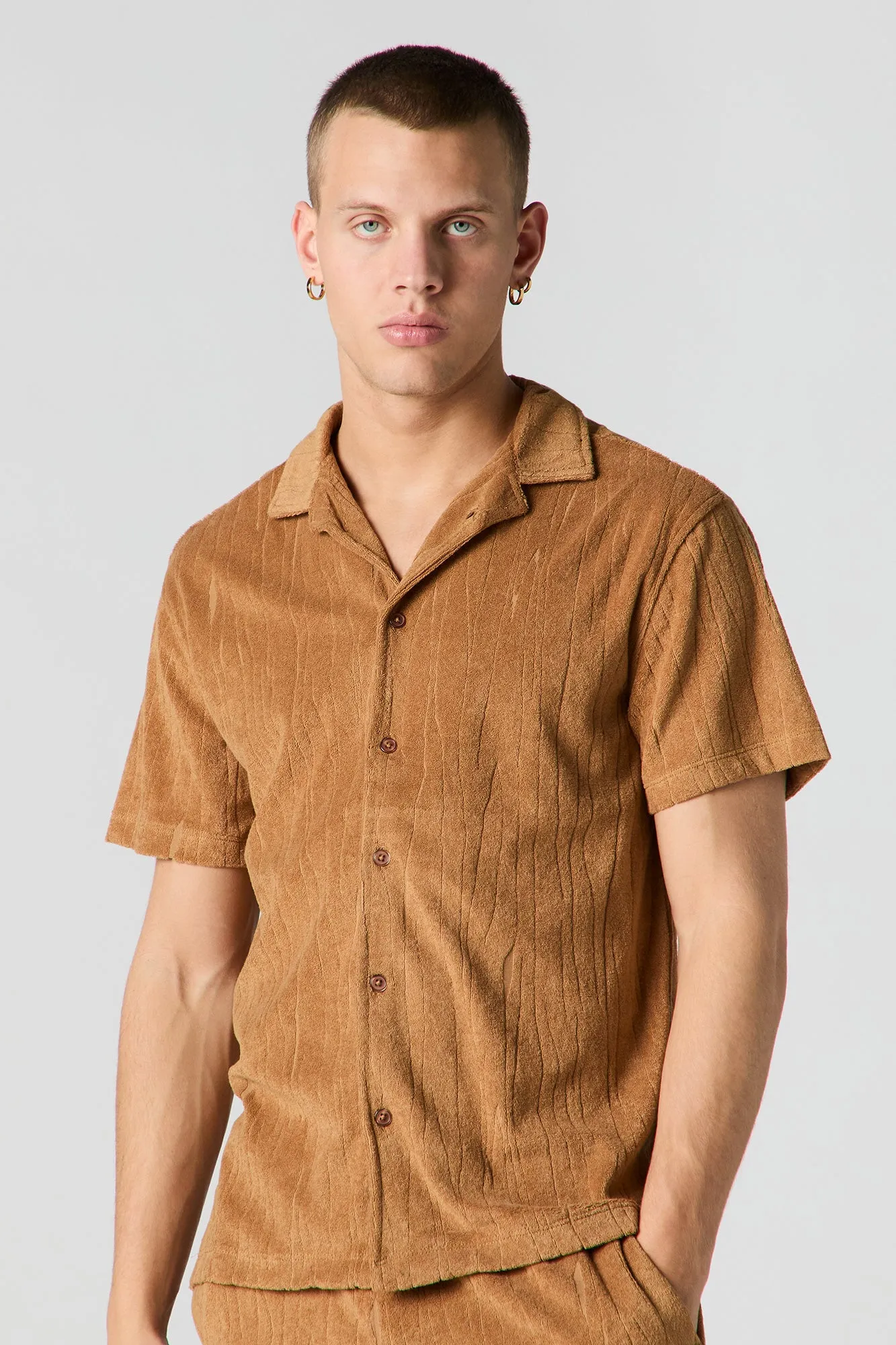 Haut boutonné en tissu éponge texturé