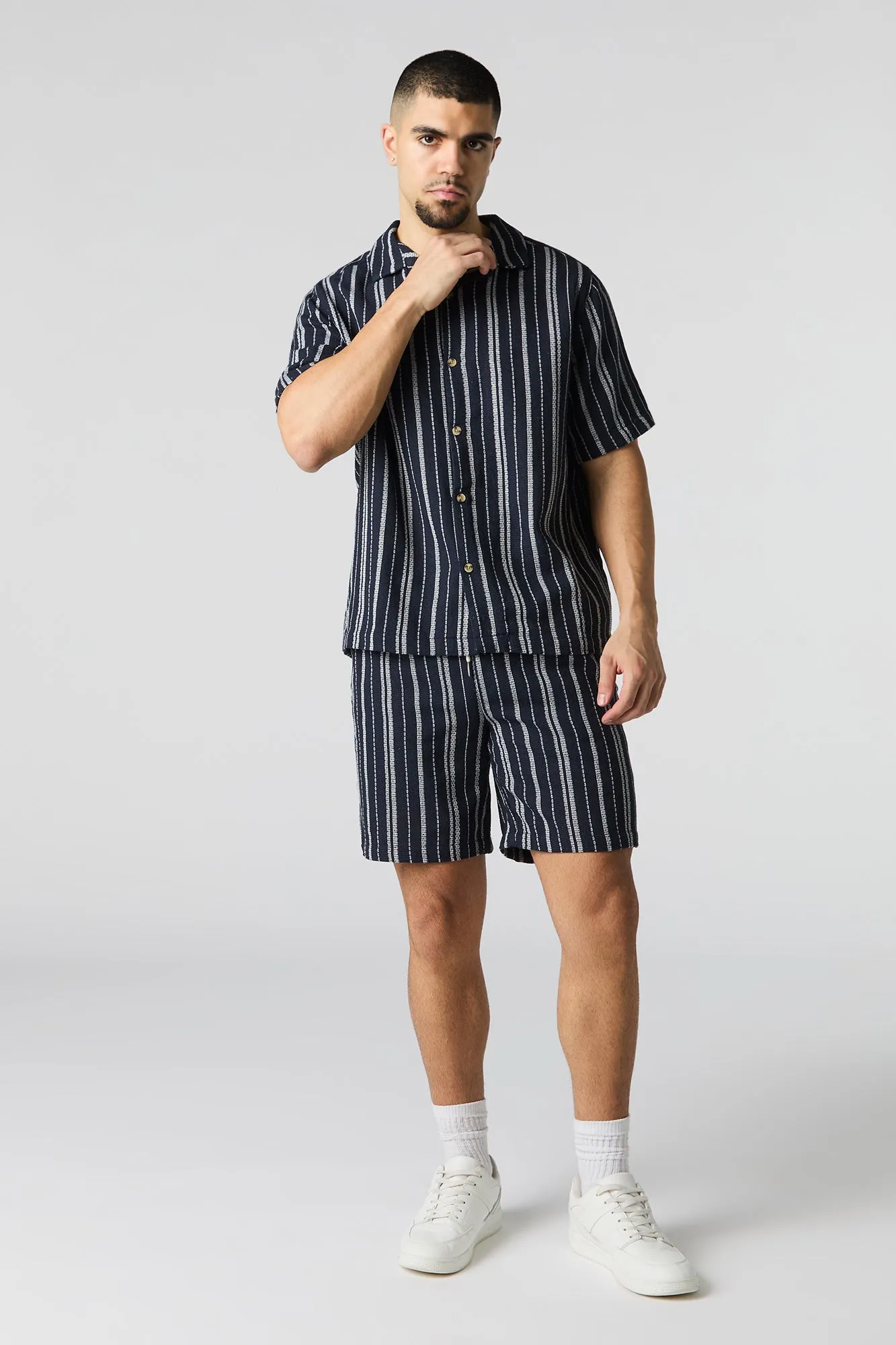 Haut boutonné en tricot texturé rayé