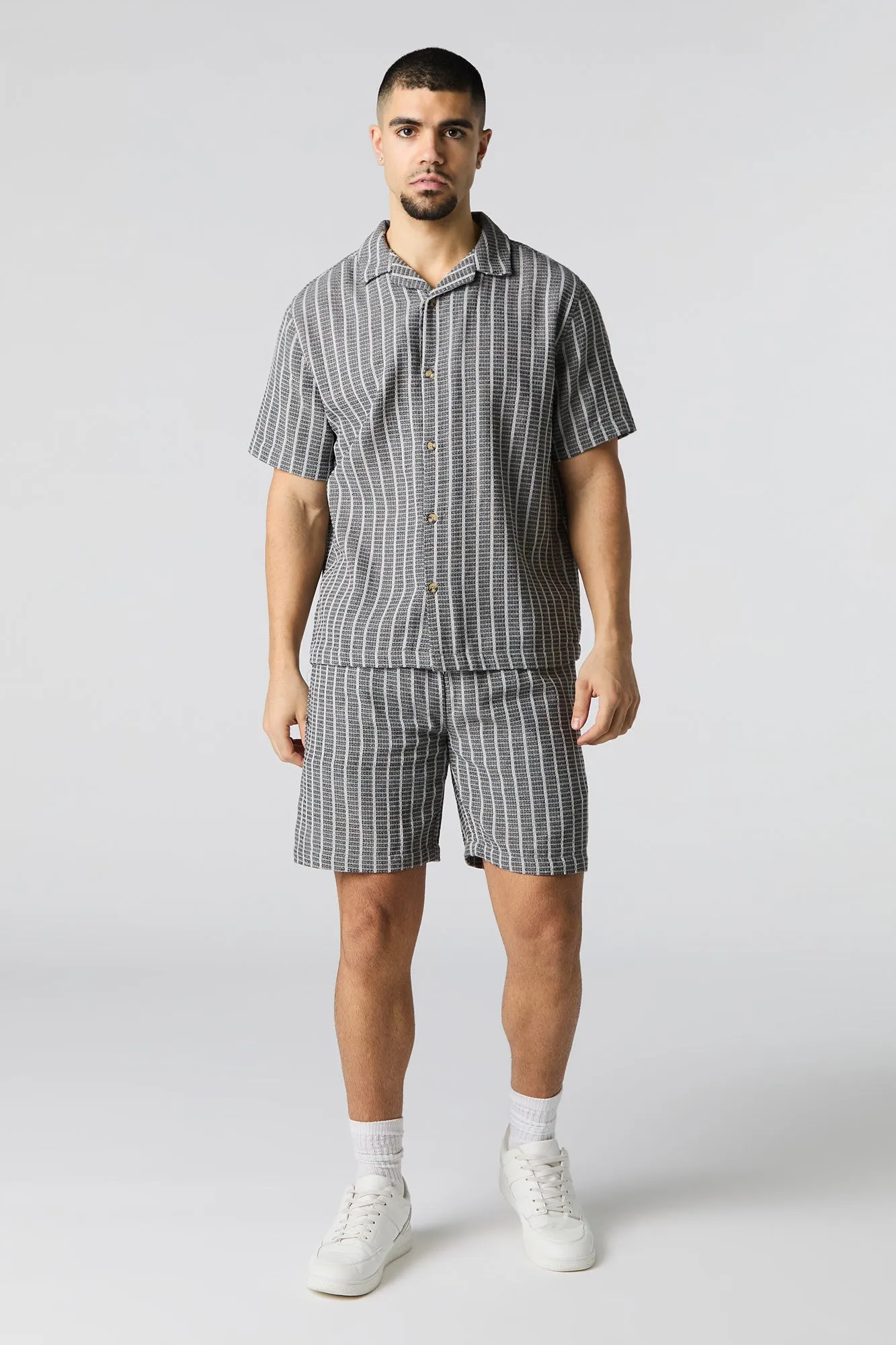 Haut boutonné en tricot texturé rayé