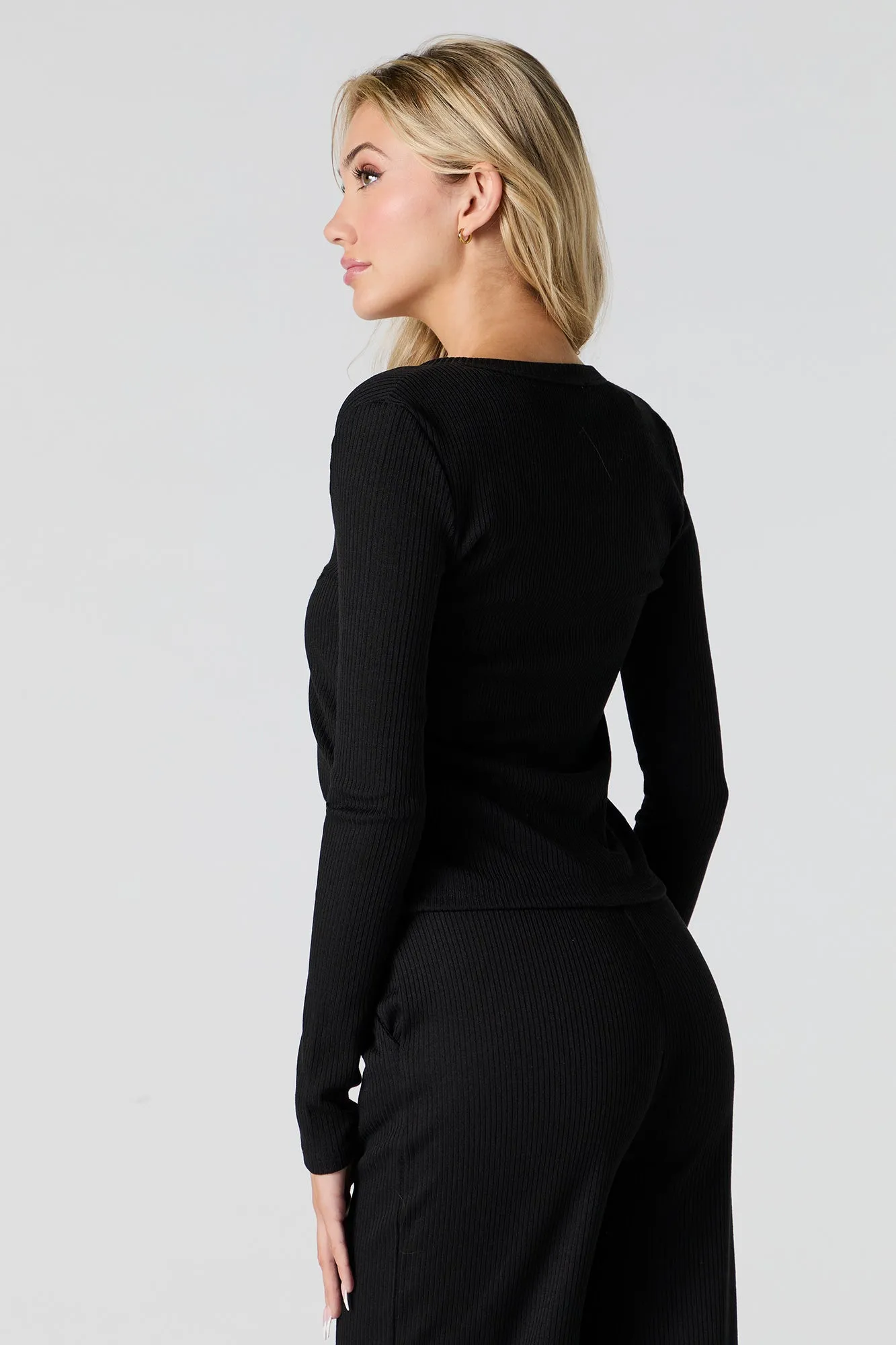 Haut en tricot côtelé à manches longues avec agrafe